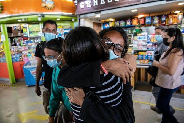 After a month-long ordeal Anyier and her family reached Santiago where she was welcomed by her sist...